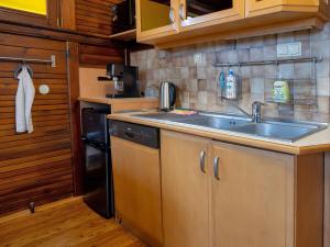 a kitchen with a sink and a dishwasher at Apartament ALINA in Kartuzy +88 photos