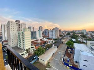 a view of a city from a balcony at Flat em Frente a USP - Centrinho - CPO - Sem Garagem in Bauru