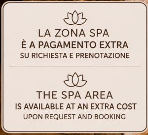 a sign that reads the spa area is available at an extra area upon request at Spa & Relax in Cairo Montenotte +3 photos