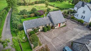 an aerial view of a house with a yard at Wren Cottage in Cowbridge +17 photos