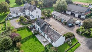 an aerial view of a large house with a yard at Wren Cottage in Cowbridge