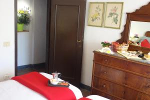 A bed or beds in a room at Fattoria Casa Sola
