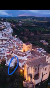 an aerial view of a village at night at Casa Abuela Dolores in Setenil