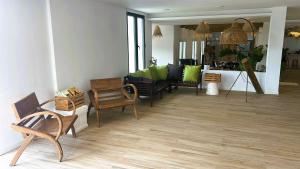 a living room with chairs and a dining room at Wawa Tarifa in Tarifa +91 photos