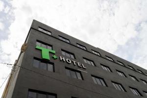 a building with a t hotel sign on it at T Hotel SP Pekan Lama in Sungai Petani +50 photos