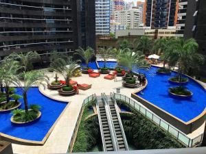 an overhead view of a resort with blue water at Landscape Beira Mar - Lindo, Luxo, Frente mar in Fortaleza