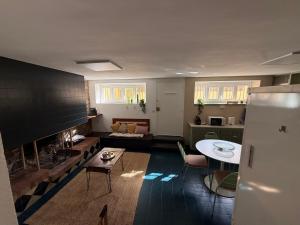a living room with a couch and a fireplace at Casa con encanto en Darnius in Darnius