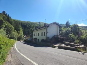 a house on the side of a road at Appartamento Sotto la Riva in Abetone