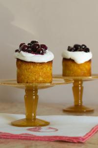 two cakes on two tiers with cherries on top at EGEO - Ortigia in Syracuse