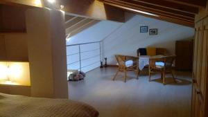 Letto o letti in una camera di B&B I Pioppi