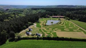 an aerial view of a large estate with a garden at Middlehead Huts in Newton