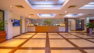 a lobby of a hospital with a waiting room at Hotel Raices Esturion in Puerto Iguazú +80 photos