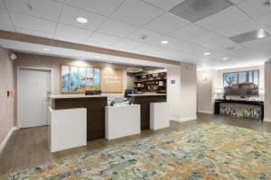 a lobby of a hospital with a waiting room at Hampton Inn & Suites Lancaster in Lancaster