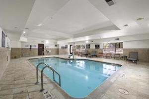 a large swimming pool in a hotel room at Hampton Inn & Suites Lancaster in Lancaster