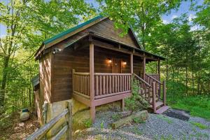a small cabin in the middle of the woods at Once Upon a Time by Venture Smoky Mountains in Sevierville