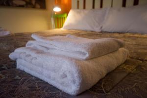 מיטה או מיטות בחדר ב-I Girasoli Locazione Turistica