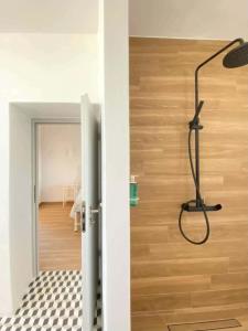 a view of a room with a floor and a lamp at Haroto Suites in Tripiti +49 photos