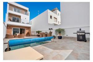 a view of a house with a swimming pool at Modern new Pool Villa in San Pedro del Pinatar