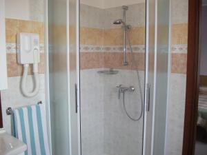 Koupelna v ubytování Albergo Breglia