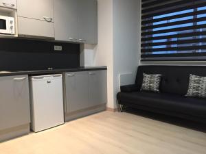 Kuchyň nebo kuchyňský kout v ubytování Apartahotel Baldiri
