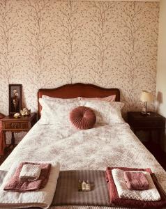 a bedroom with a large bed with two night stands at Vintage Boutique Room in Lavra