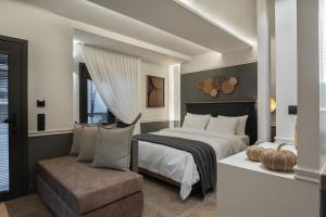Gulta vai gultas numurā naktsmītnē Kosmitis Suites Athens