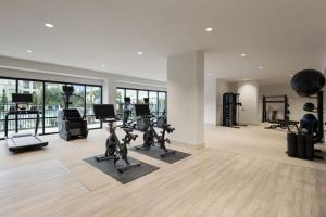 a gym with treadmills and cardio equipment in a building at EVEN Hotel Orlando Universal Blvd by IHG in Orlando