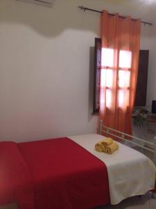 A bed or beds in a room at B&B Is Janas E5391