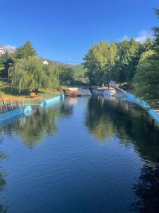 a view of a river from a bridge at Malhada Do Rei Mountain House in Pampilhosa da Serra