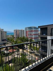a view of a city from a balcony at South Inn Hotel in Vlorë