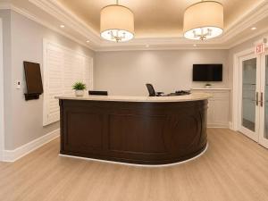 a large office with a reception desk in a room at Monaco Bay Club 8 in Fort Lauderdale