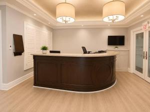 an office with a reception desk in a room at Monaco Bay Club 2 in Fort Lauderdale