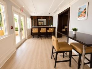 a kitchen and dining room with a table and chairs at Monaco Bay Club 3 in Fort Lauderdale