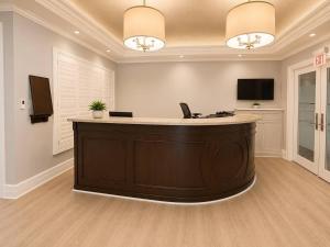 an office with a reception desk in a room at Monaco Bay Club 10 in Fort Lauderdale