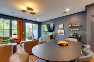 a dining room with a table and chairs at Dock Access! 'Hook & Heron Lakefront Getaway' in Greenwood