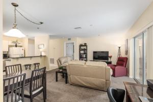 a living room with a couch and a table at Condominium at Lakeside Golf & CC - unit 104 apts in Inverness