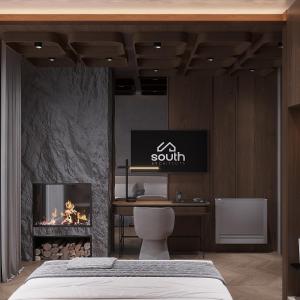 a bedroom with a bed and a fireplace at Boutique Hotel by Ruci in Terihat