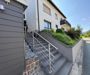 a set of stairs leading up to a building at Fewo Tanja in Bestwig