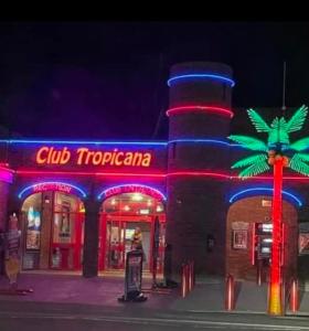 a building with a sign that reads club troperia at Maisy's Retreat in Chapel Saint Leonards +3 photos