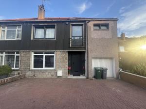 a house with a driveway in front of it at House Aurora in Edinburgh