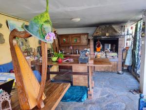 a room with a wooden table and a wooden chair at Middle Earth in El Paso