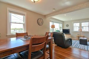 a dining room with a table and chairs at Ryal Side Hideaway Cove in Beverly +24 photos