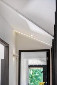a ceiling light above a mirror in a room at The Hayloft in Strabane
