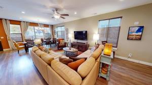 a living room with a couch and a tv at Entrada at Moab #640 in Moab +37 photos