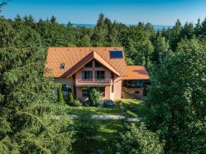 a house in the middle of a forest at SeviCris in Lissa