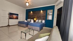 Zona d'estar a Alameda Cariari Boutique Hotel