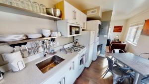a kitchen with a sink and a counter top at Moab Flats #5 in Moab