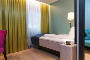 Postel nebo postele na pokoji v ubytování Thon Hotel Terminus
