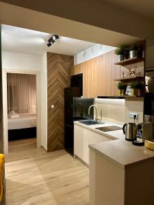 a kitchen with a sink and a counter top at SMART COASTAL RETREAT Apartment in Alexandroupoli