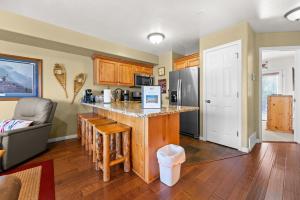 a kitchen with a counter top in a room at Basin Lakeside Getaway MH702Near Powder Mtn Hot Tub in Eden +38 photos
